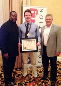 Pictured from left: J.J. Smith, former Kansas City Chief, Matt Adams, Ed Keller, founder and president of HearStrong Foundation