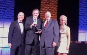 Alan Lowell and Leanne Polhill presented the IHS Chapter of the Year Award to the Alabama Society of Hearing Healthcare Professionals, represented by Dick Kaiser and Howard Hancock.