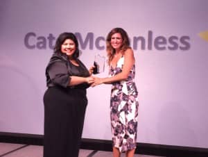 Membership & Marketing Manager Fran Vincent presents Kate McCandless with the James P. Lovell Award.