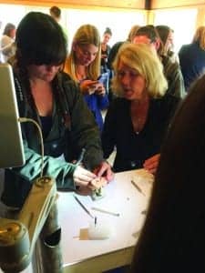 At the Oticon Village, which demonstrated a variety of different technologies from office management systems and audiology business networks to new diagnostic equipment, Oticon Medical’s Nancy Plant provided students with an opportunity by to drill into skull material so they could better understand the challenges faced by ENT surgeons when placing an abutment for a bone-anchored hearing aid.