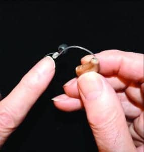 Figure 7. Demonstrate to the patient this inconspicuous “training wheel”—which is actually a piece of tubing that helps them push the RIC into the ear canal.