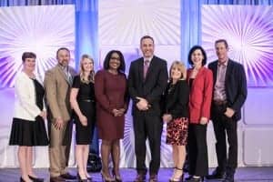 (l-r) Oticon’s Danielle Tryanski, Michael Irby, Jessica DeFauw, Sheena Oliver, Gary Rosenblum, Nancy Palmers and Guest Presenters Karen Post and David Meerman Scott (missing, Colette Carlson).