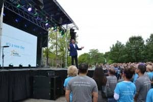 Starkey President Brandon Sawalich kicks off the Livio AI product launch at the company's headquarters in Eden Prairie, Minn.