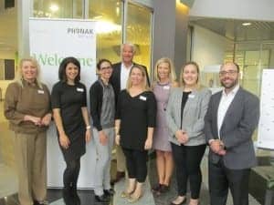 Barb VanSomeren, Lori Rakita, Kailen Berry, AuD, Jan Jan Metzdorff, Christine Jones, AuD, Anna Nicole Klutz, AuD, and John Urbaniak at Phonak US headquarters near Chicago.